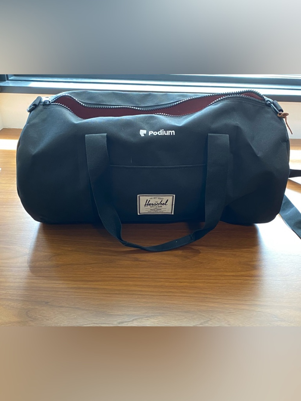 Herschel Black Duffel Bag with Red Lining. Brand New!
